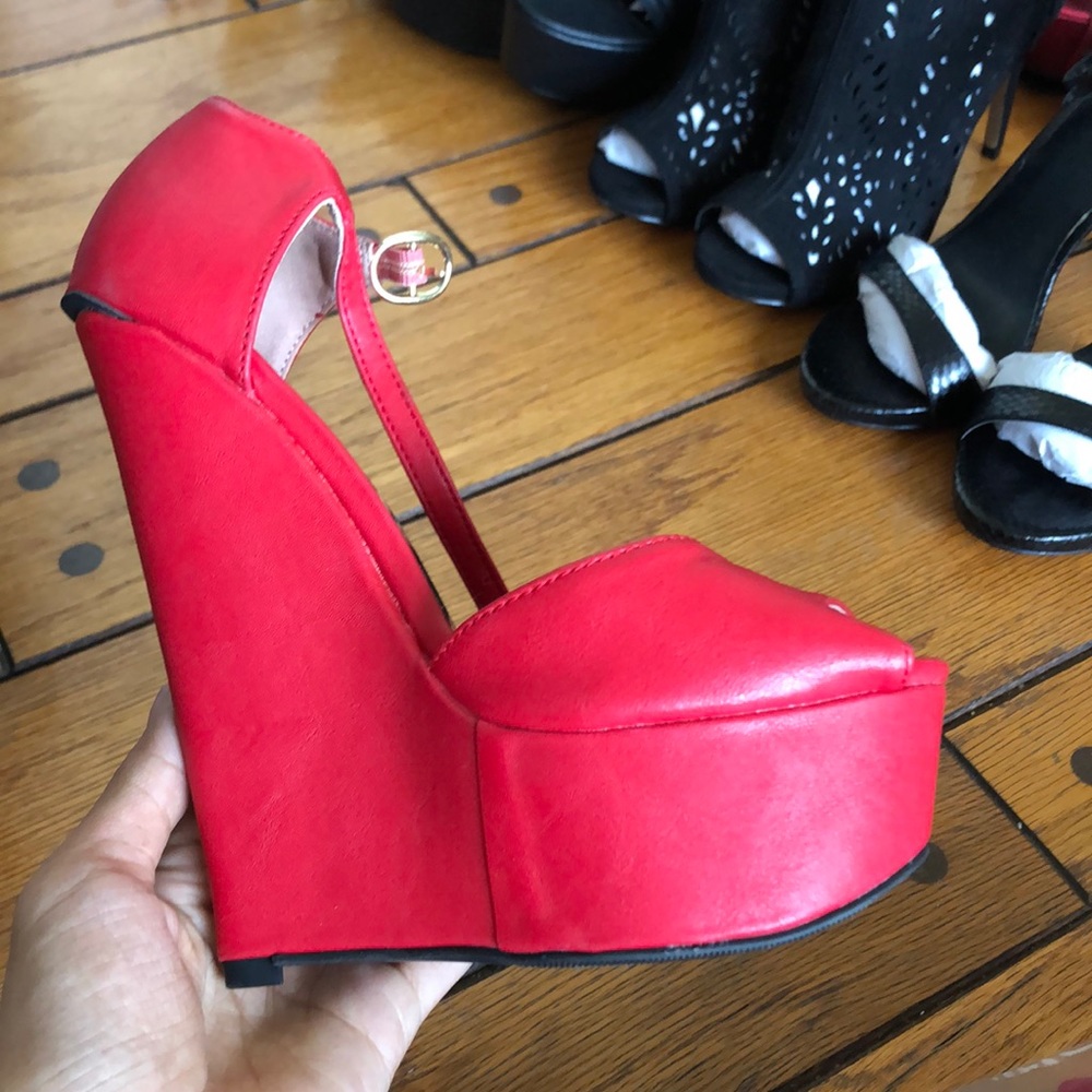 Brand new Red wedge size 6.5